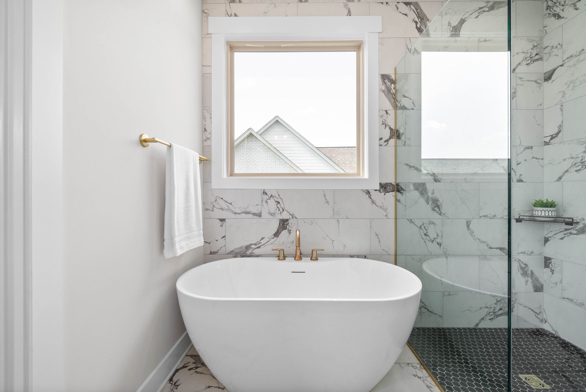 122 Augusta Trail Springfield, TN 37172 - Photo 23 of 51 a white bath tub sitting next to a shower