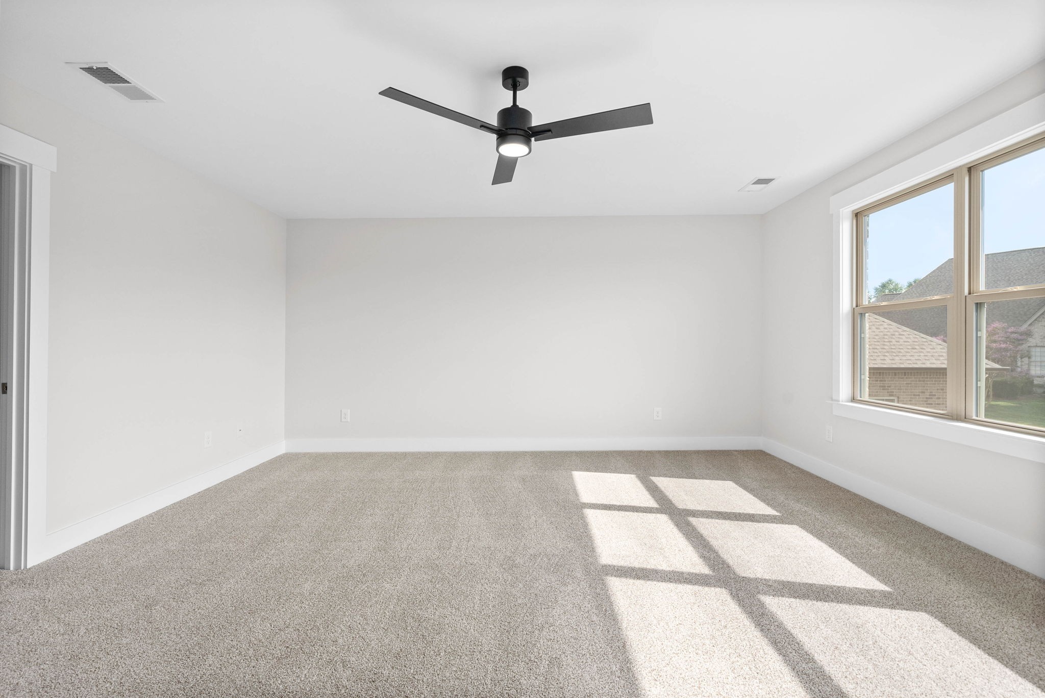 122 Augusta Trail Springfield, TN 37172 - Photo 32 of 51 an empty room with windows and ceiling fan