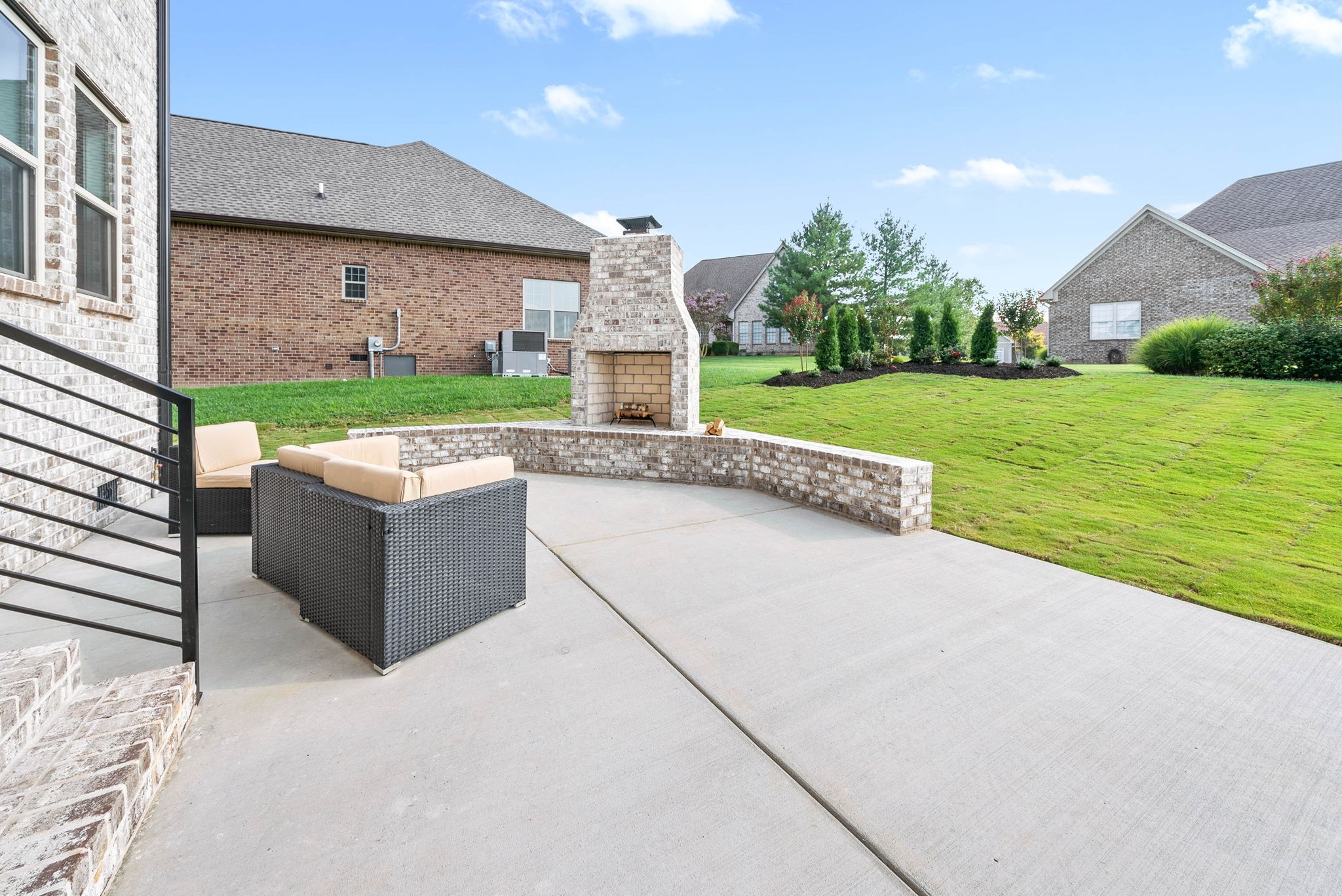 122 Augusta Trail Springfield, TN 37172 - Photo 38 of 51 a patio with table and chairs and a yard