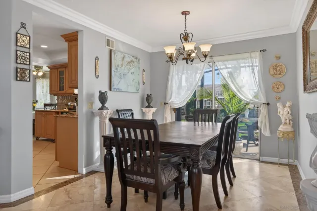 a view of a livingroom with furniture and a window