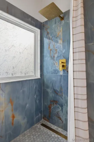 a kitchen with stainless steel appliances and cabinets