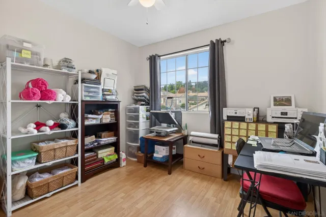 a view of a backyard with plants and a patio