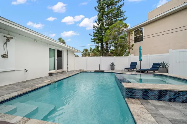 a view of a back yard of the house