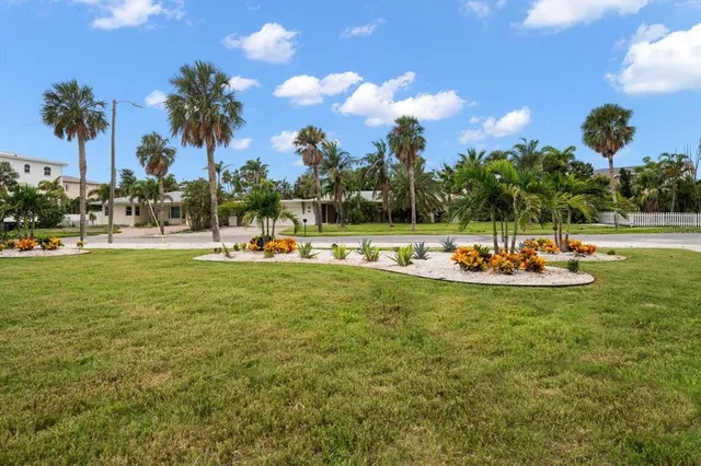 a view of a swimming pool and an outdoor space