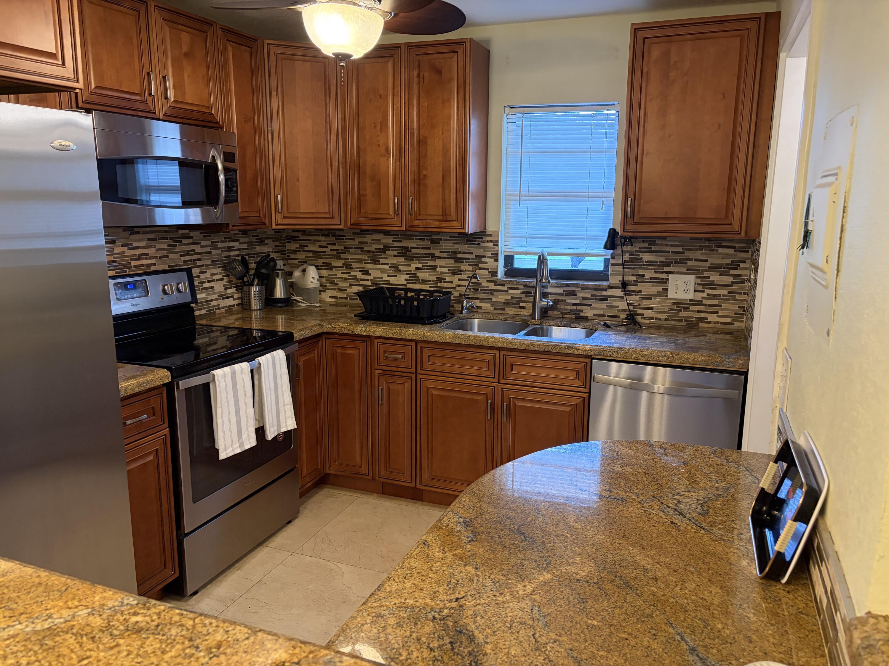 9273 Southwest 8th Street, Unit 201 Boca Raton, FL 33428 - Photo 3 of 14 IMG_9327