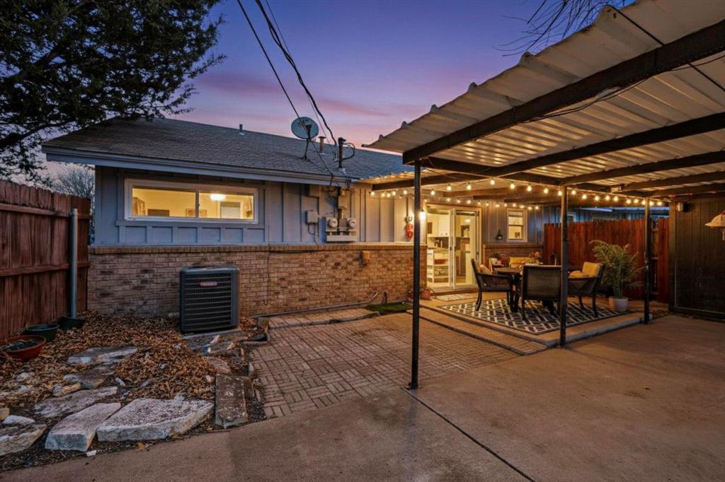 153 Sheri Lane Hurst, TX 76053 - Photo 9 of 16 157 Side - Patio