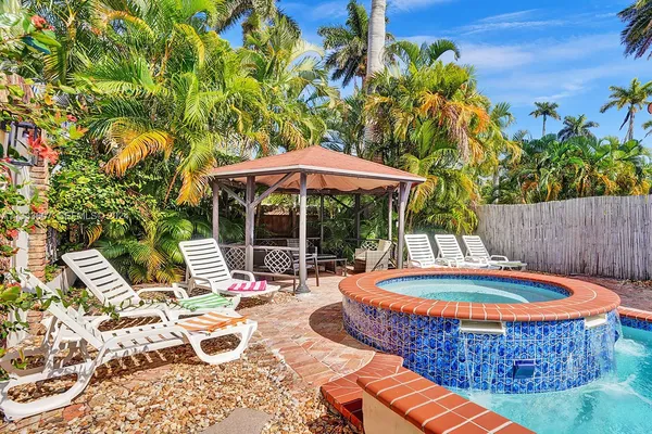 a outdoor space with pool and furniture
