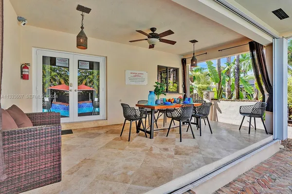 a view of a dining room with furniture window and outside view