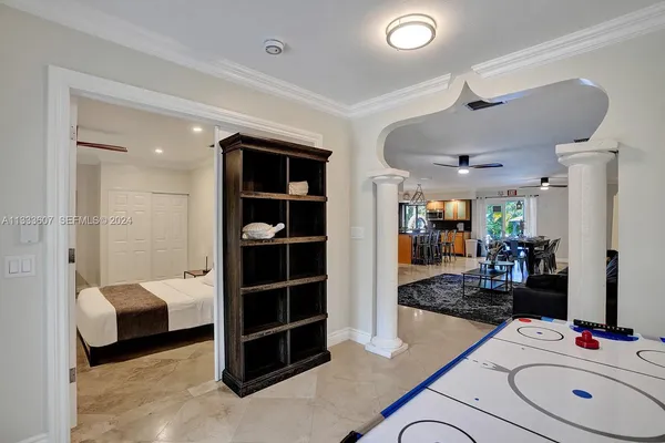a room with furniture and white walls