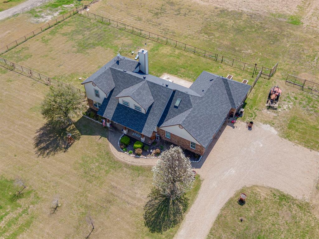130 Eubanks Road Maypearl, TX 76064 - Photo 33 of 39 an aerial view of a house with a swimming pool