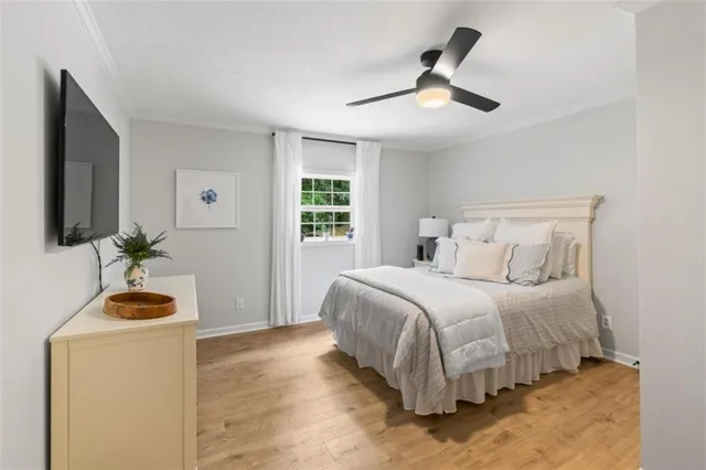 a large white kitchen with appliances cabinets and a counter top space