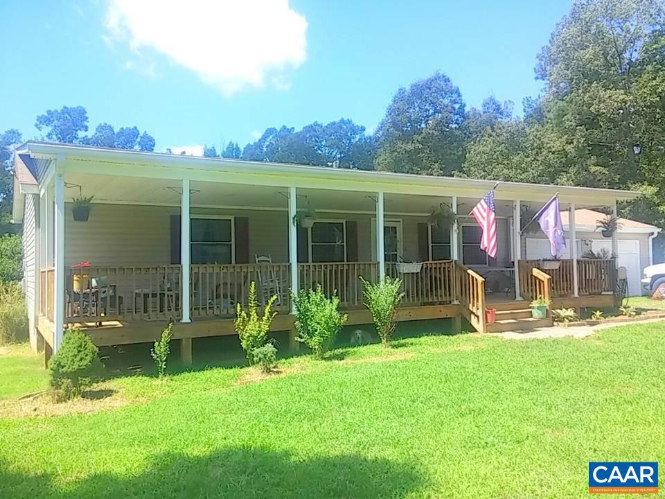 1119 Hollands Road Palmyra, VA 22963 - Photo 1 of 17 a view of a house with backyard and porch