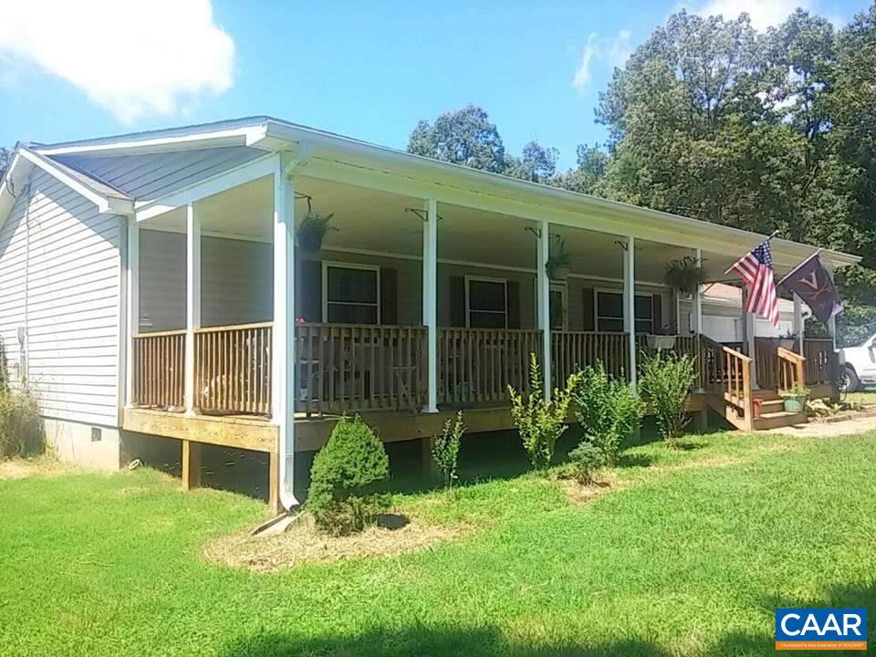 1119 Hollands Road Palmyra, VA 22963 - Photo 11 of 17 a view of a house with a yard and potted plants