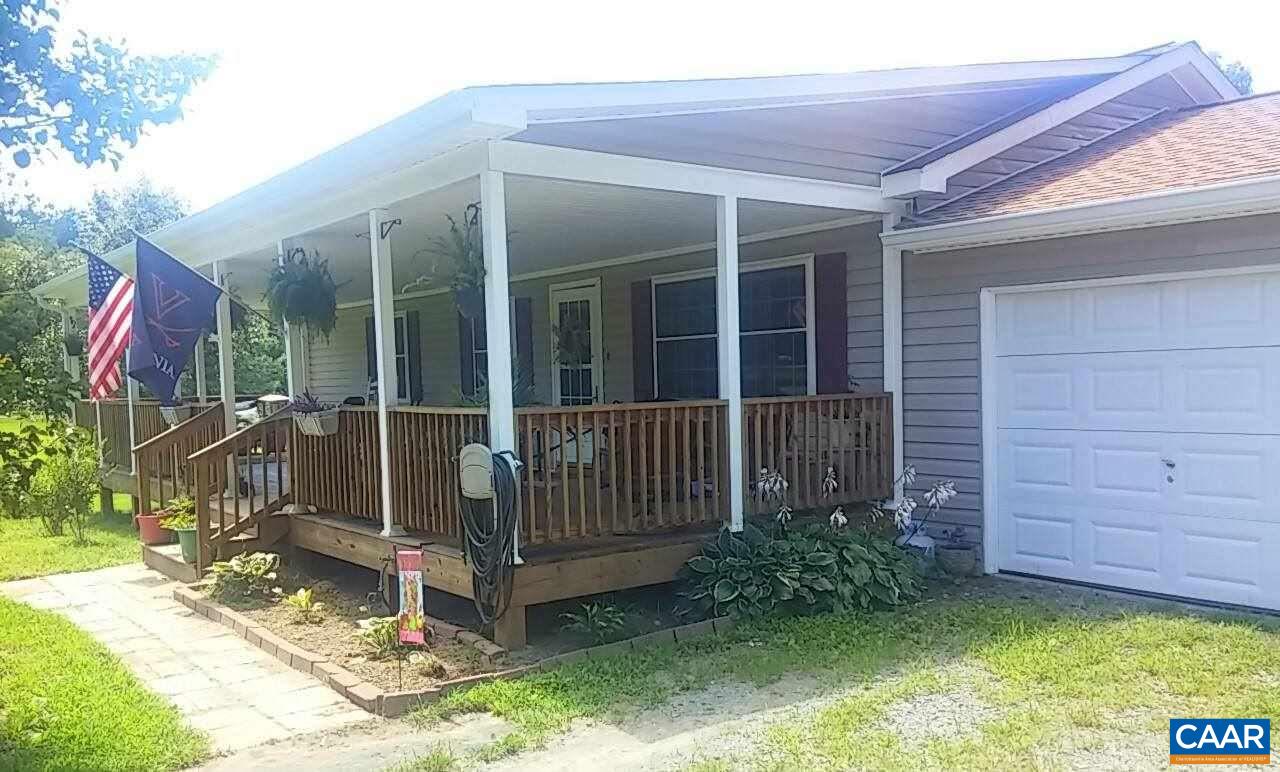 1119 Hollands Road Palmyra, VA 22963 - Photo 12 of 17 a view of a house with a small yard and wooden floor and fence