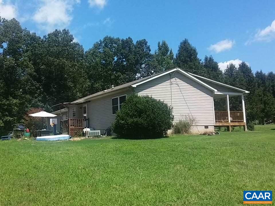 1119 Hollands Road Palmyra, VA 22963 - Photo 13 of 17 a view of a house with a yard and sitting area