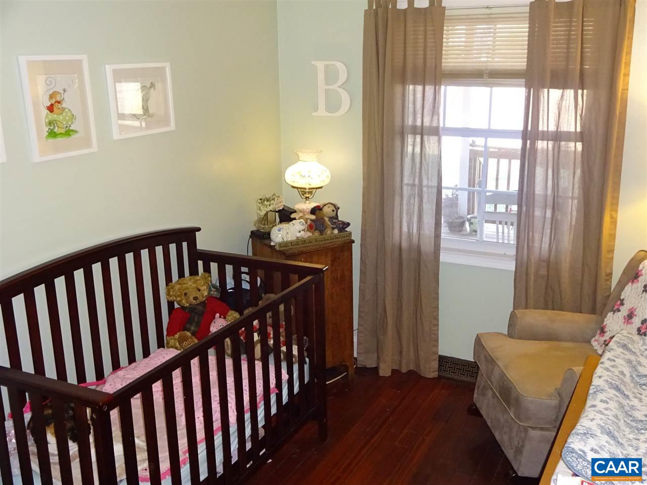 1119 Hollands Road Palmyra, VA 22963 - Photo 8 of 17 a bedroom with furniture and a window