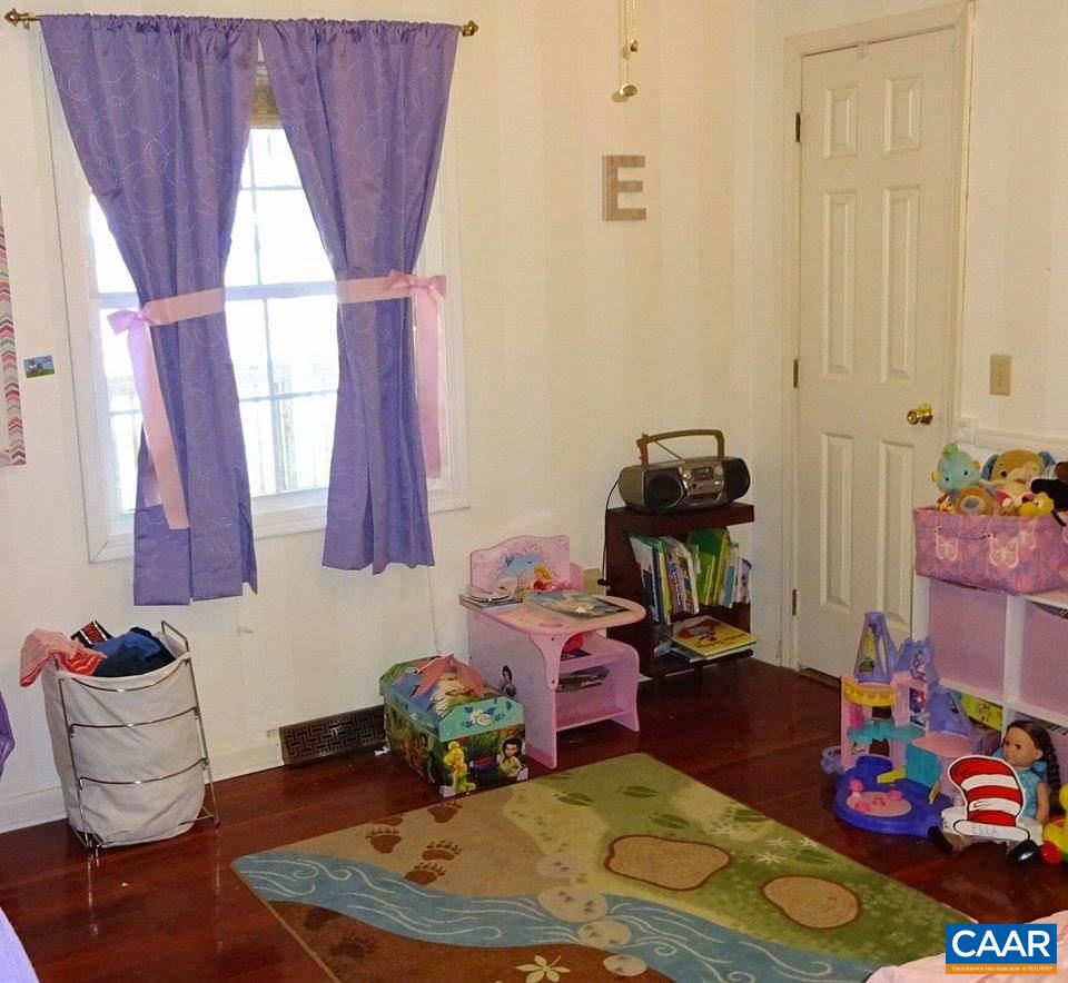1119 Hollands Road Palmyra, VA 22963 - Photo 9 of 17 a room with furniture and a window