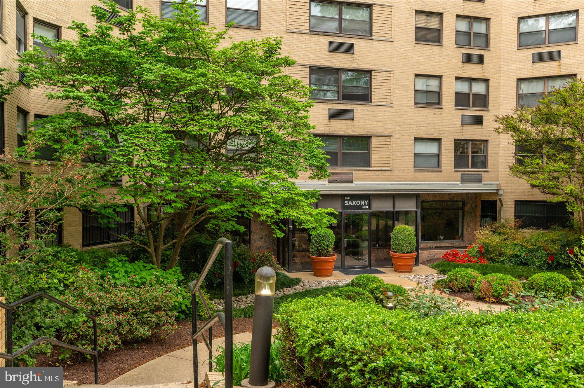 1801 Clydesdale Place Northwest, Unit 505 Washington, DC 20009 - Photo 16 of 21 a view of a building with a garden