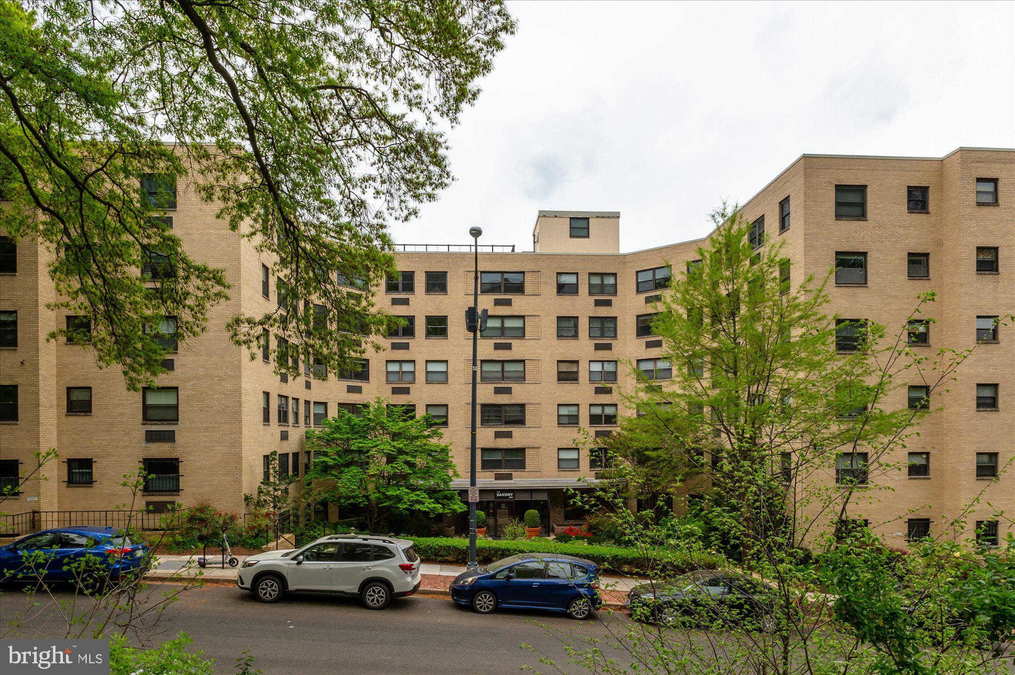 1801 Clydesdale Place Northwest, Unit 505 Washington, DC 20009 - Photo 17 of 21 a cars parked in front of a building