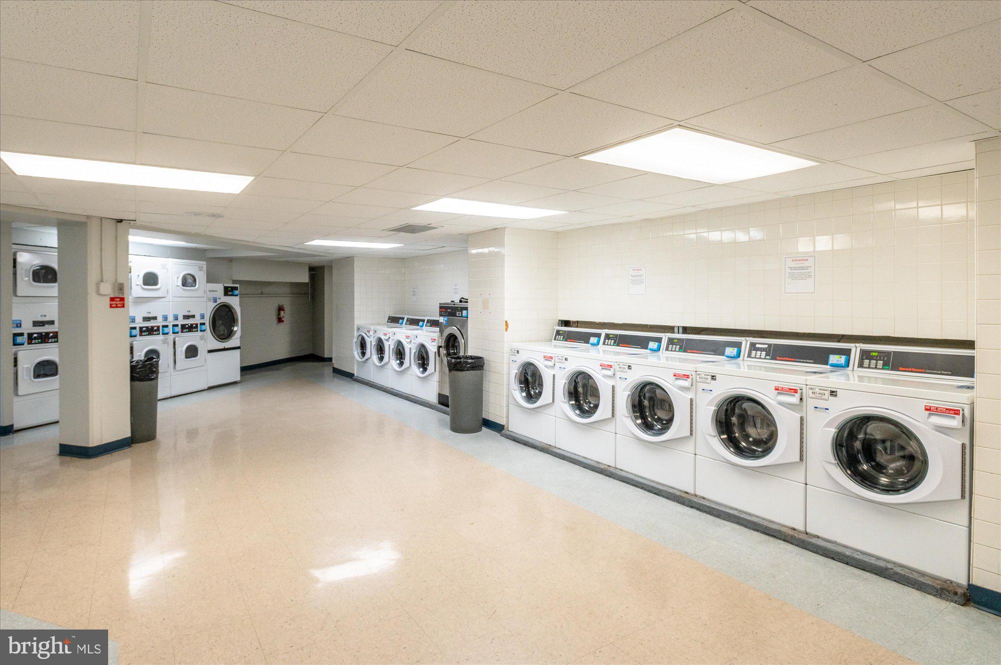 1801 Clydesdale Place Northwest, Unit 505 Washington, DC 20009 - Photo 18 of 21 a view of kitchen with washer and dryer