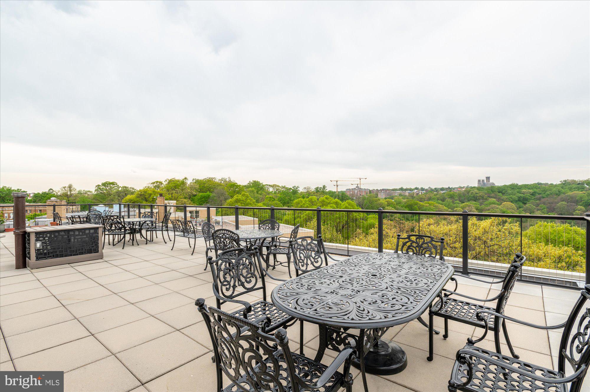 1801 Clydesdale Place Northwest, Unit 505 Washington, DC 20009 - Photo 20 of 21 a view of a terrace with furniture
