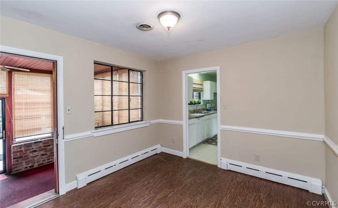 6008 Brookfield Road Richmond, VA 23227 - Photo 15 of 28 an empty room with wooden floor and windows