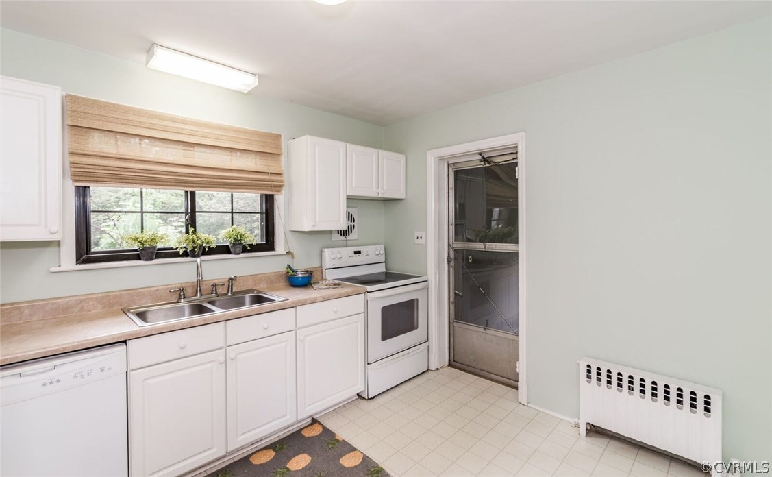 6008 Brookfield Road Richmond, VA 23227 - Photo 18 of 28 a kitchen with a sink cabinets and window