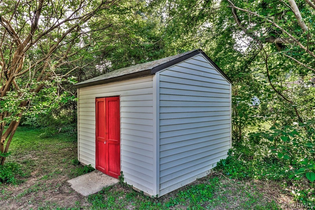 6008 Brookfield Road Richmond, VA 23227 - Photo 23 of 28 a view of a small house with a small yard