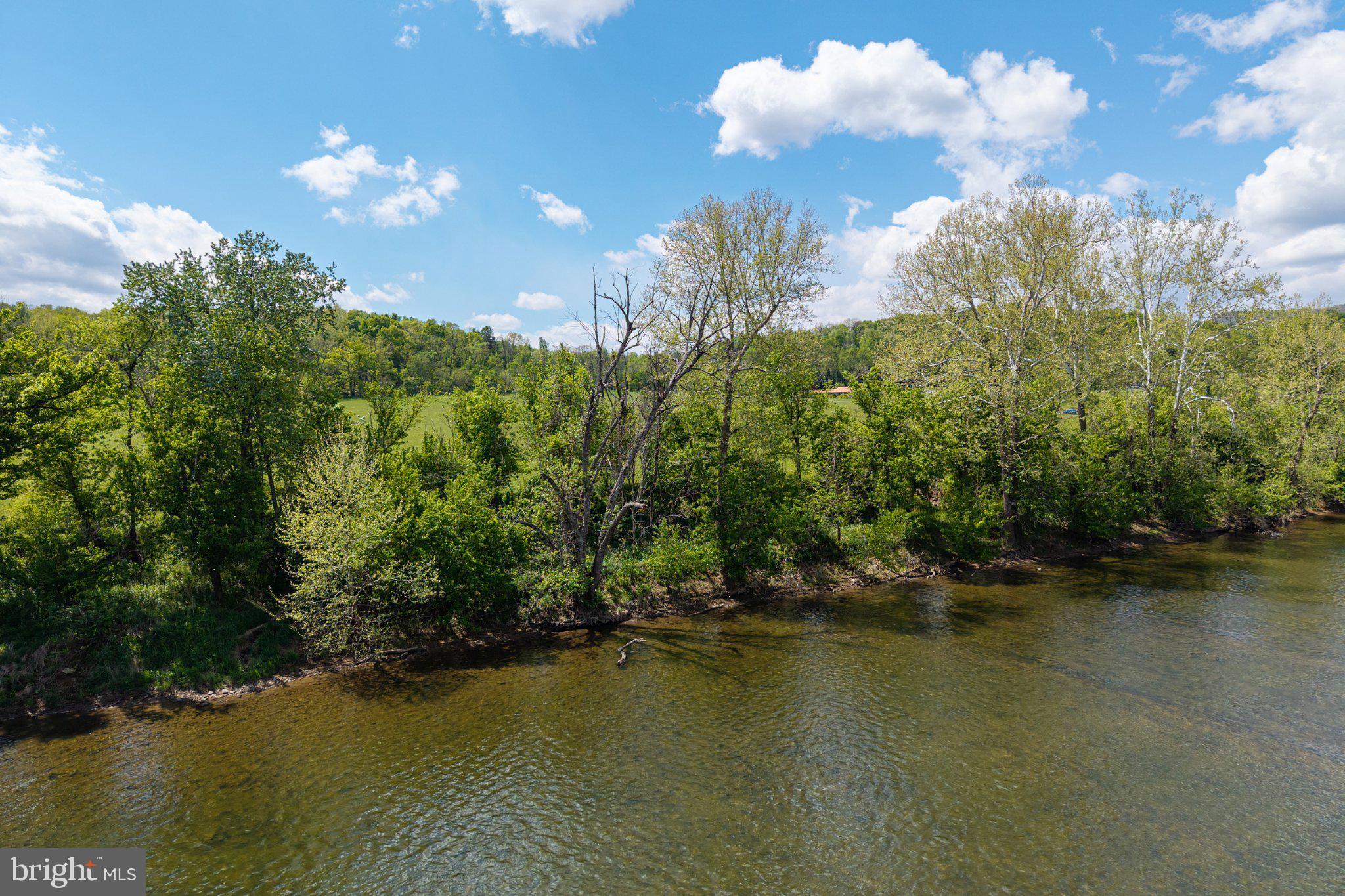 0 Good Mill Road Rileyville, VA 22650 - Photo 17 of 51 a view of a lake with houses in the background
