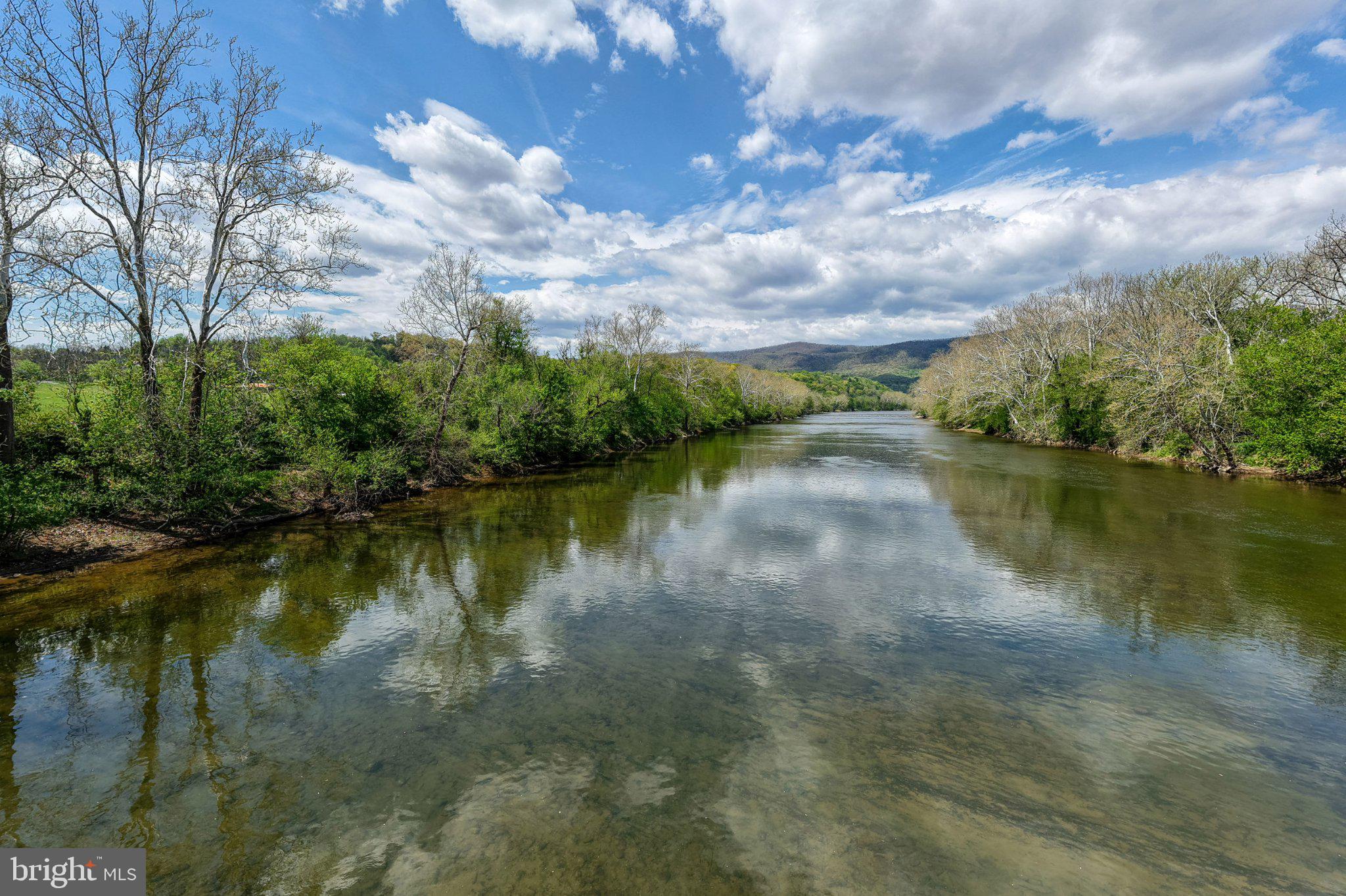 0 Good Mill Road Rileyville, VA 22650 - Photo 22 of 51 Serene river reflecting a vibrant sky.