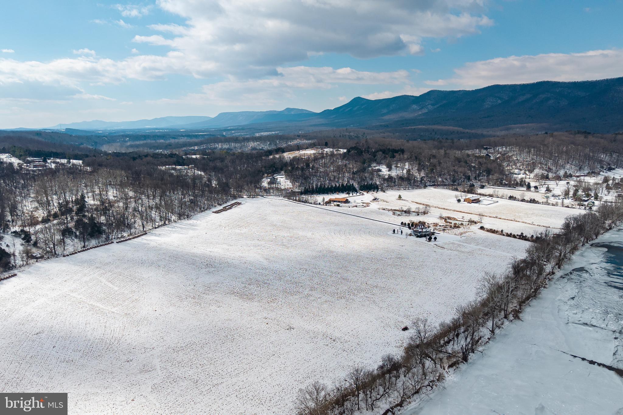 0 Good Mill Road Rileyville, VA 22650 - Photo 6 of 46 a view of a lake with mountain