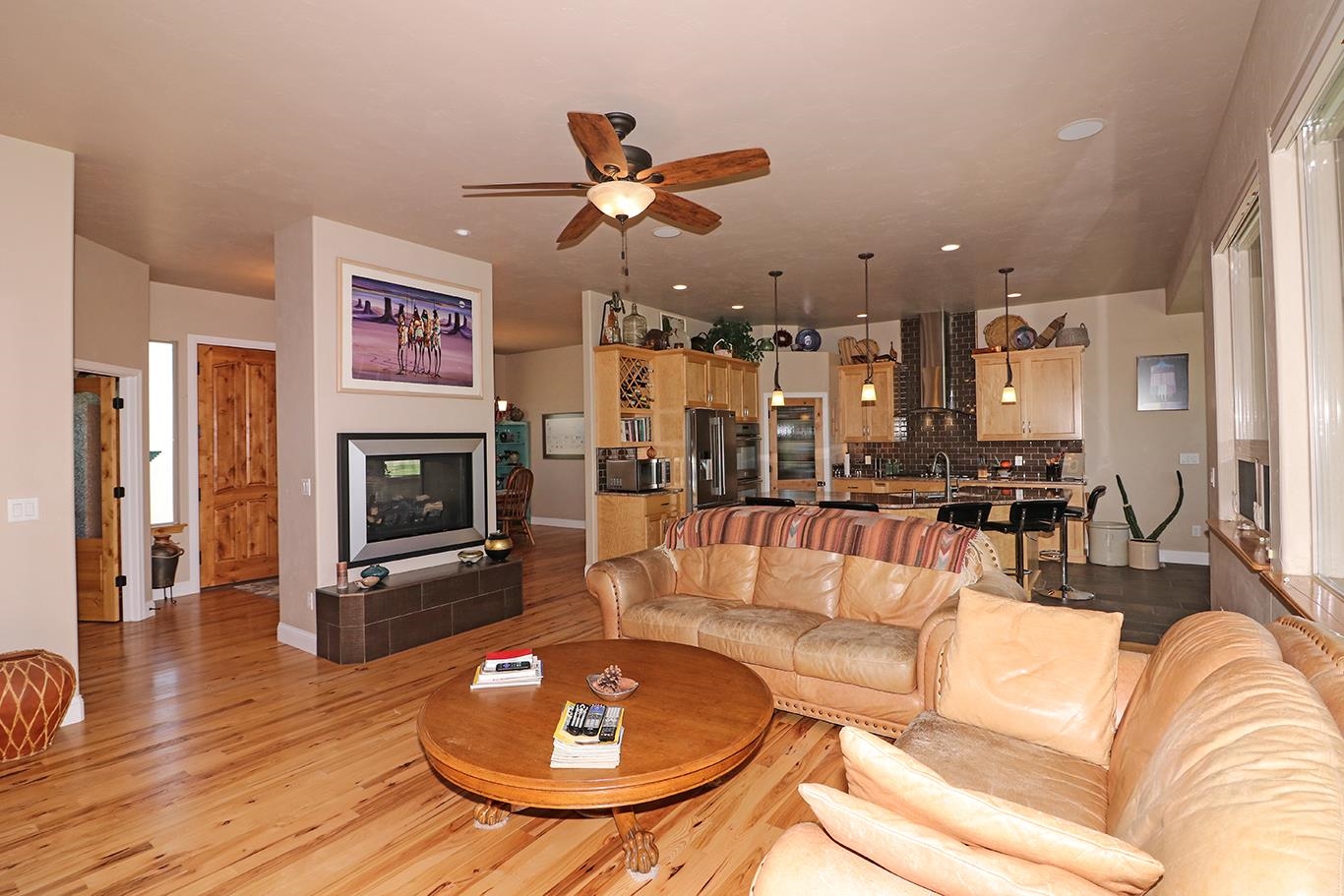 1983 J Road Fruita, CO 81521 - Photo 5 of 42 a living room with furniture and a fireplace