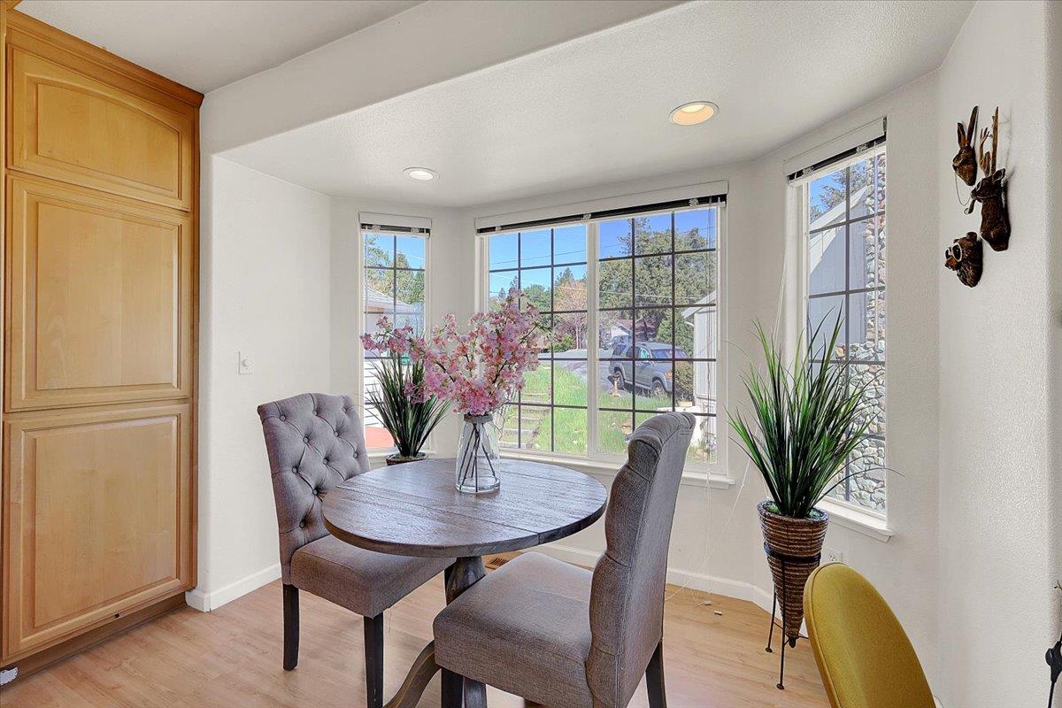 16153 Janet Way Grass Valley, CA 95949 - Photo 13 of 38 a view of a dining room with furniture window and wooden floor