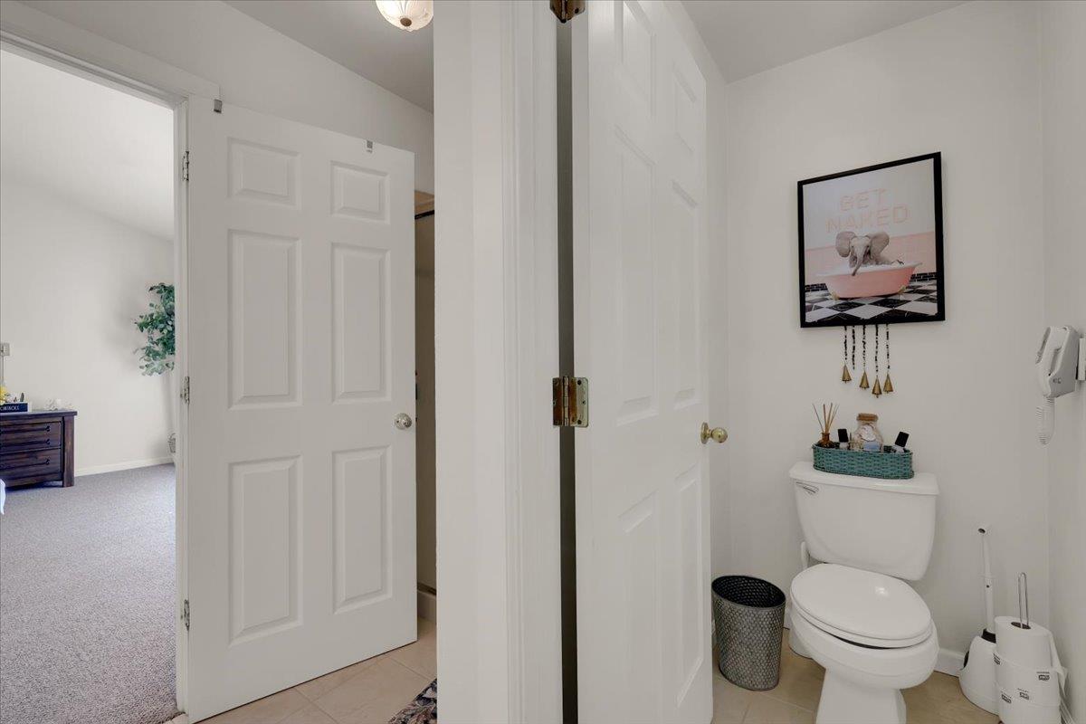 16153 Janet Way Grass Valley, CA 95949 - Photo 20 of 38 a bathroom with a toilet sink and mirror