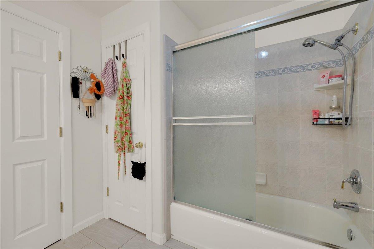 16153 Janet Way Grass Valley, CA 95949 - Photo 23 of 38 a bathroom with a shower and a tub