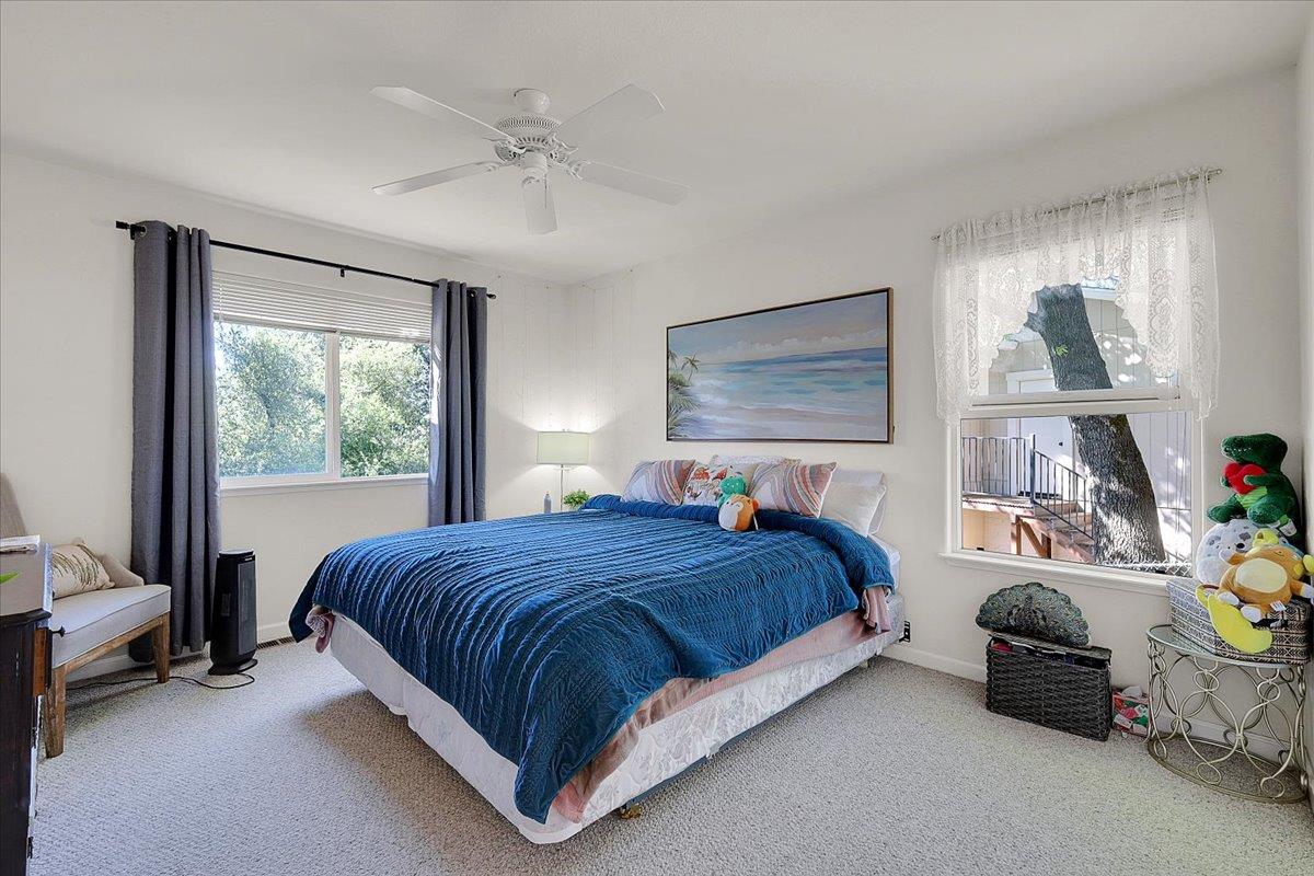 16153 Janet Way Grass Valley, CA 95949 - Photo 24 of 38 a bedroom with a bed and a window