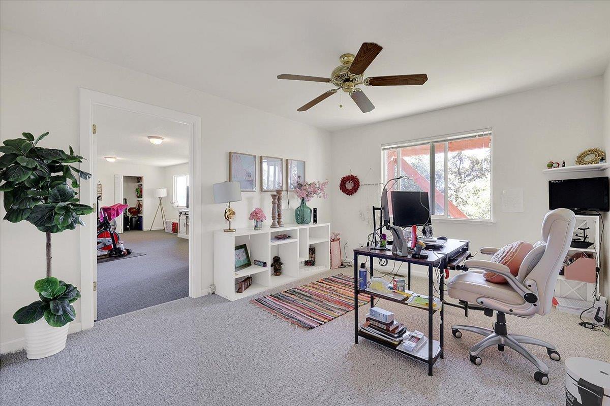 16153 Janet Way Grass Valley, CA 95949 - Photo 25 of 38 a living room with furniture and a flat screen tv
