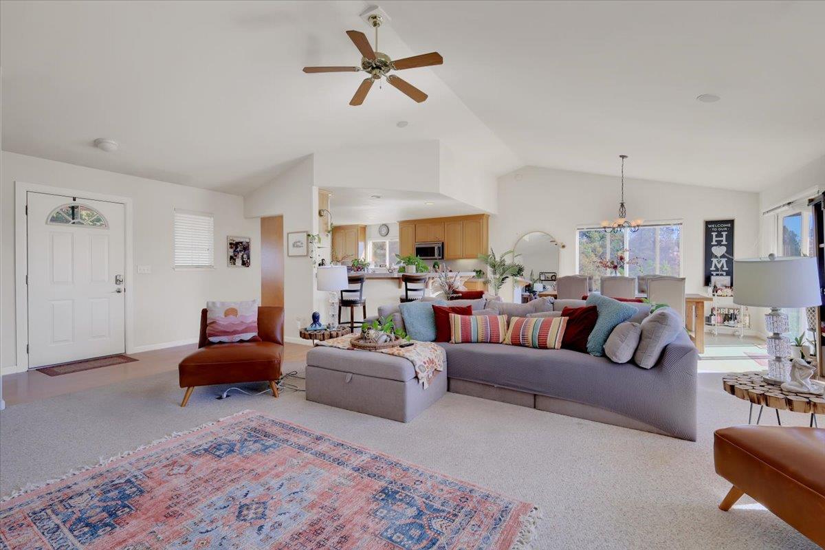 16153 Janet Way Grass Valley, CA 95949 - Photo 6 of 38 a living room with furniture or kitchen view and a chandelier