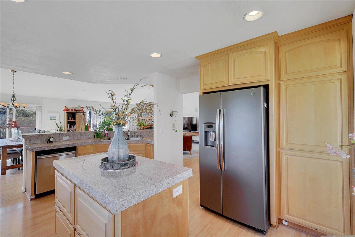 16153 Janet Way Grass Valley, CA 95949 - Photo 10 of 38 a kitchen with stainless steel appliances granite countertop a refrigerator a sink and a stove