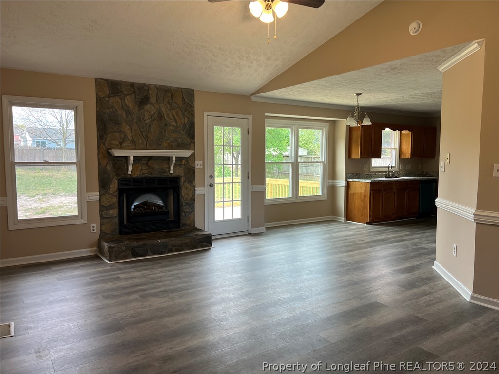 308 Kernstown Road Raeford, NC 28376 - Photo 3 of 15 a living room with a fireplace and window