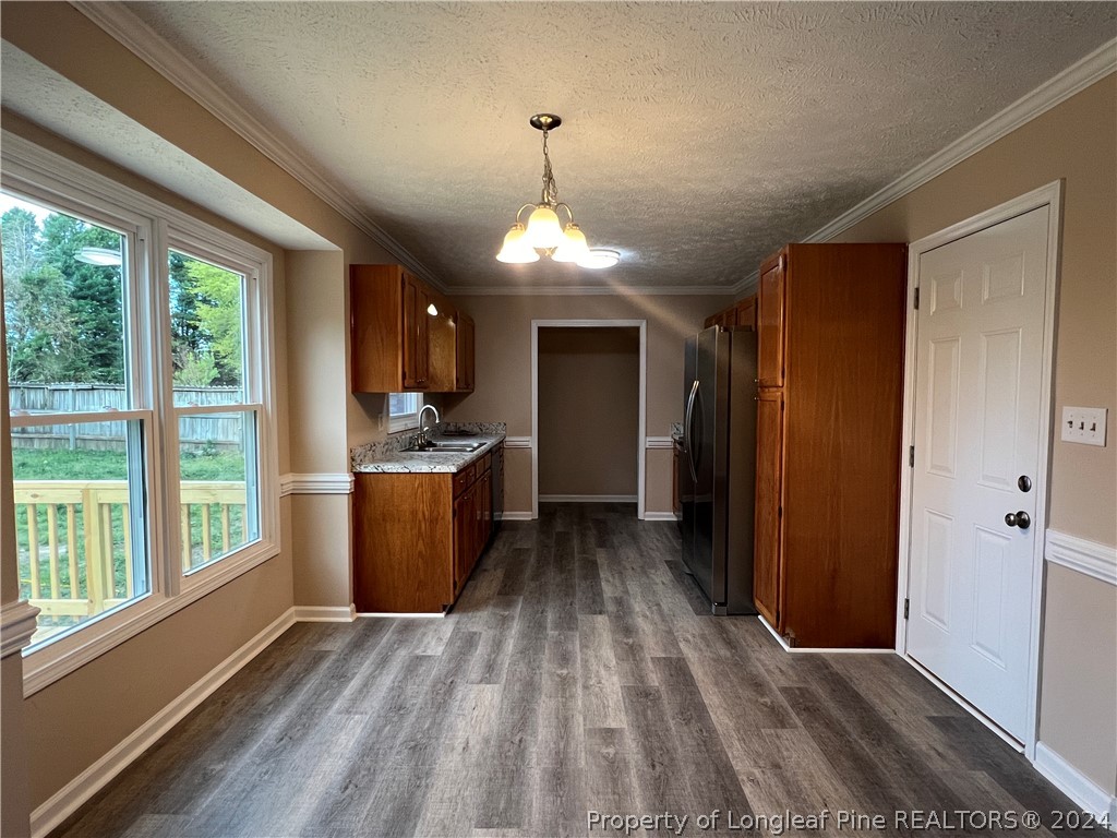 308 Kernstown Road Raeford, NC 28376 - Photo 4 of 15 a view of a room with wooden floor and a window