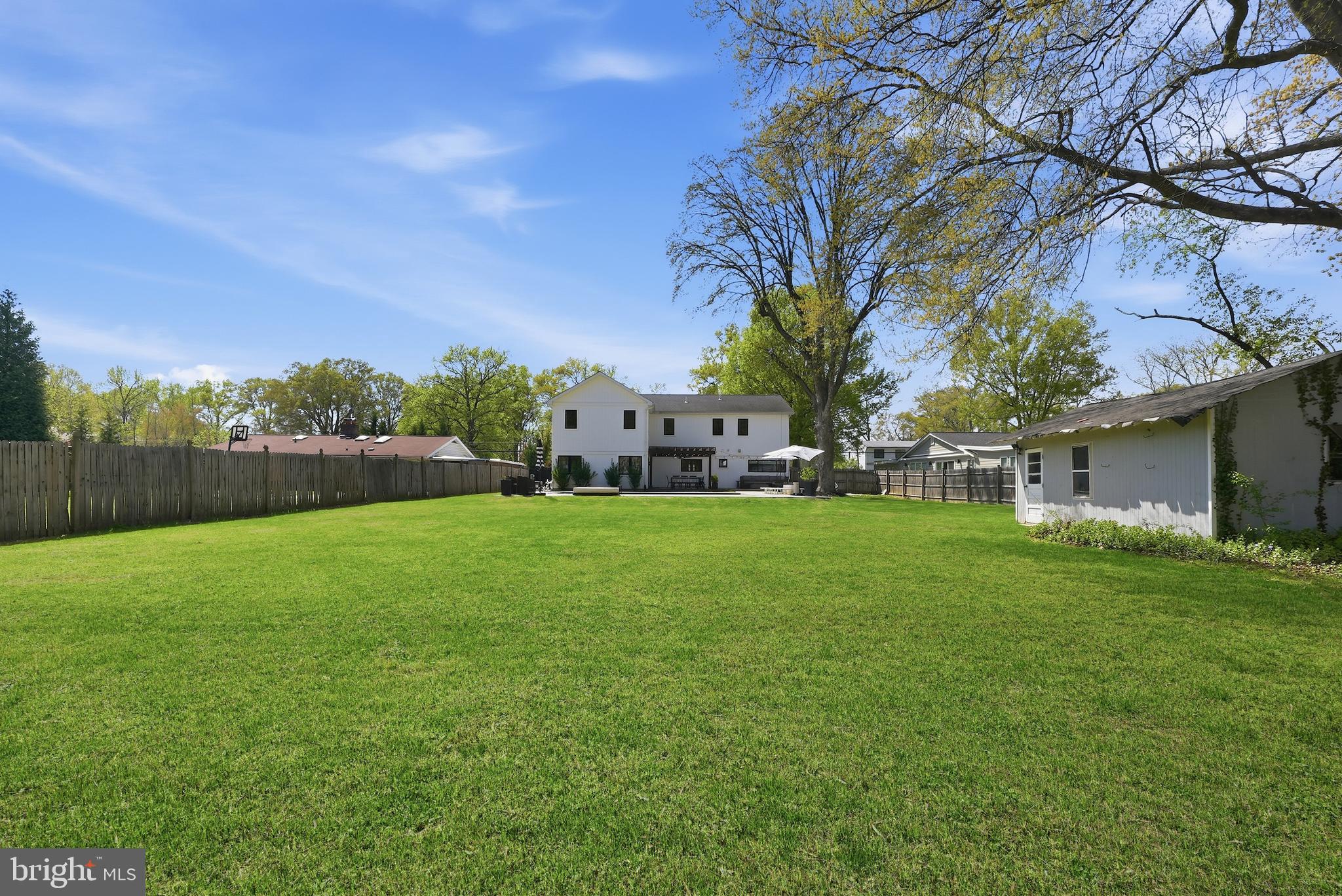 7739 Schelhorn Road Alexandria, VA 22306 - Photo 52 of 54 Over a half acre of level cleared backyard