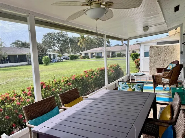 a view of a patio with swimming pool