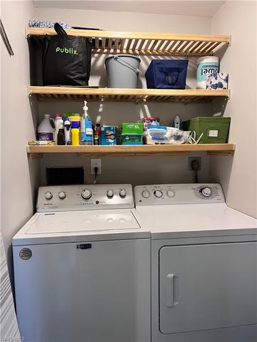 a utility room with dryer and washer