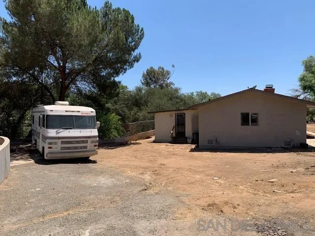 9935 Blossom Valley Road El Cajon, CA 92021 - Photo 11 of 36 a front view of a house with a yard