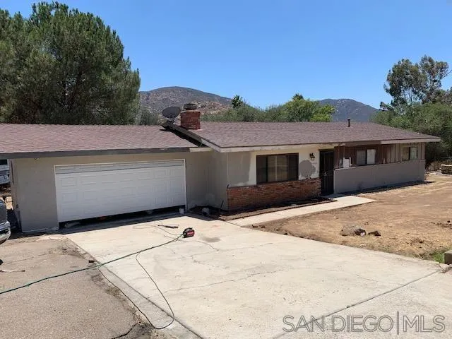 9935 Blossom Valley Road El Cajon, CA 92021 - Photo 12 of 36 a backyard of a house