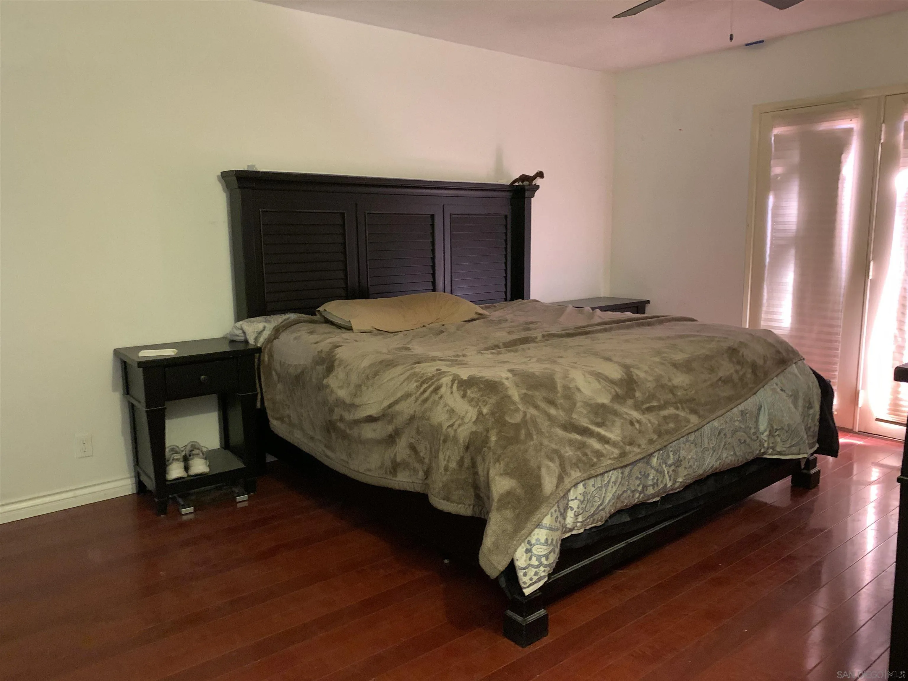 9935 Blossom Valley Road El Cajon, CA 92021 - Photo 14 of 36 a bedroom with a bed and a dresser