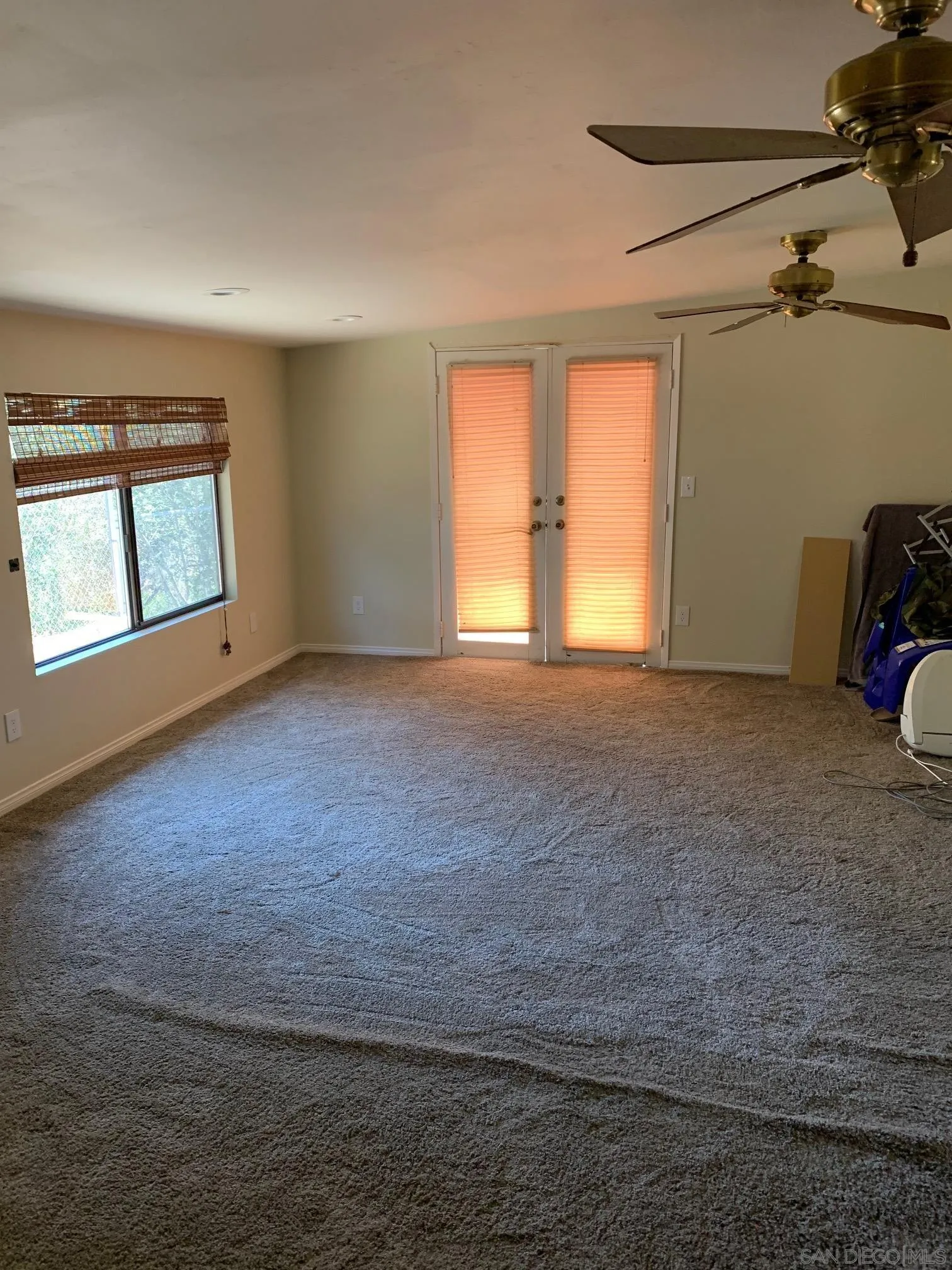 9935 Blossom Valley Road El Cajon, CA 92021 - Photo 17 of 36 a view of an empty room with a window