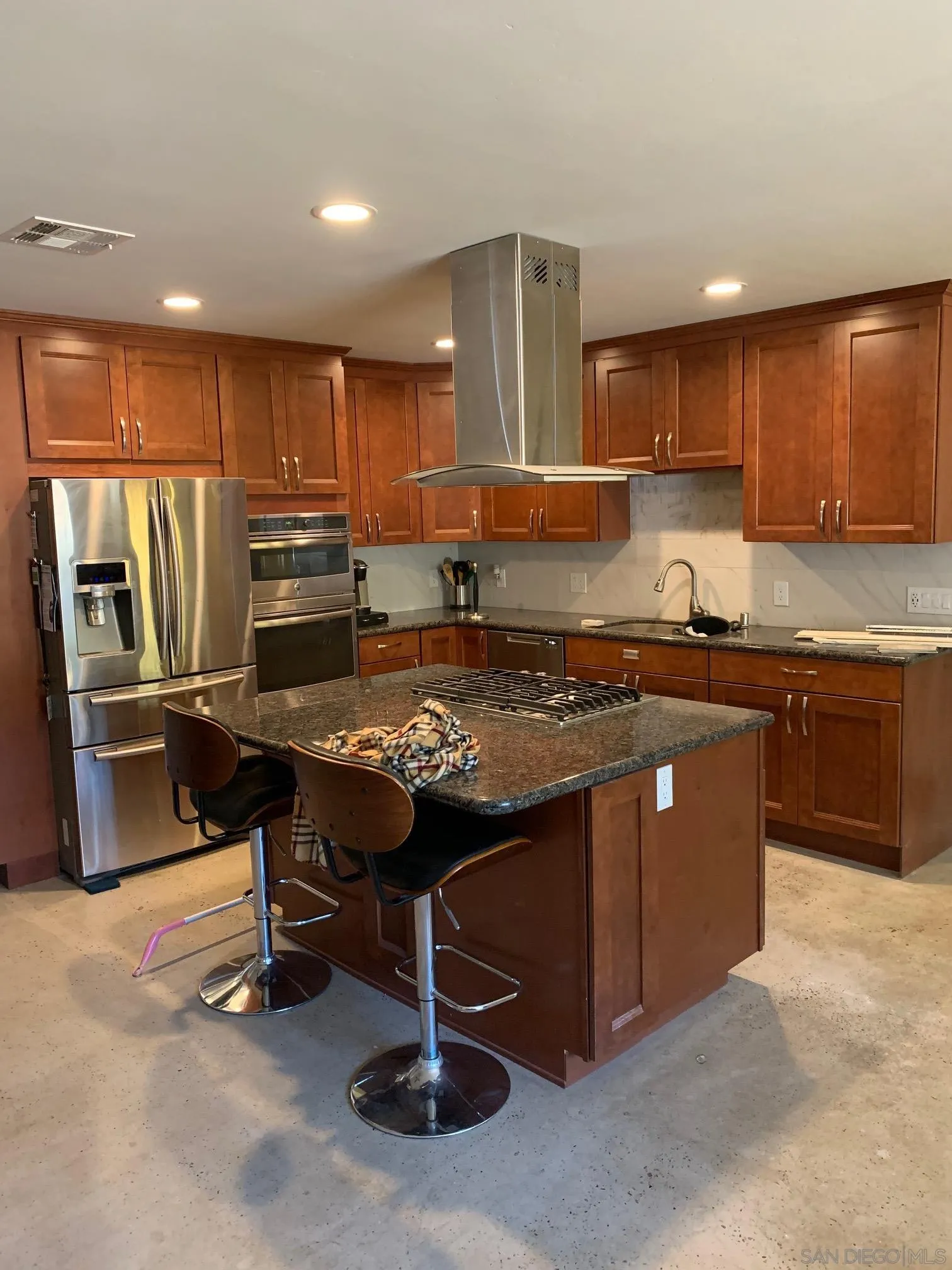 9935 Blossom Valley Road El Cajon, CA 92021 - Photo 18 of 36 a kitchen with a sink appliances and cabinets