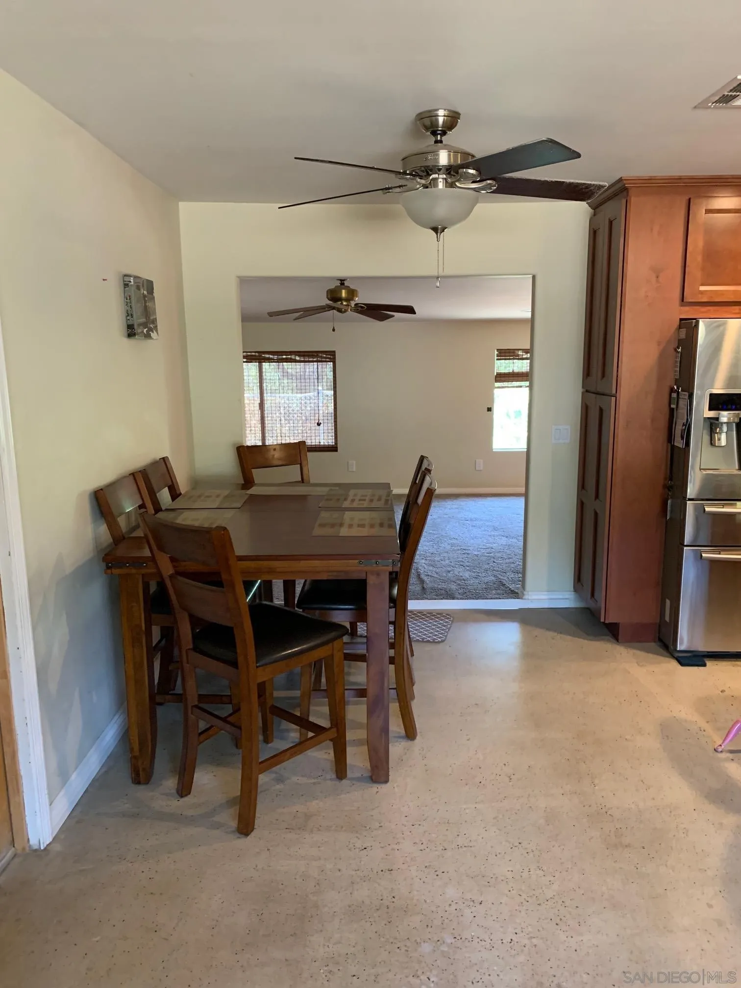 9935 Blossom Valley Road El Cajon, CA 92021 - Photo 20 of 36 a dining room with furniture and window